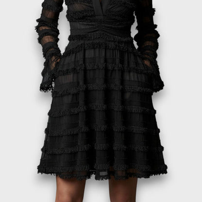 Parisa – Vestido midi con flecos transparentes