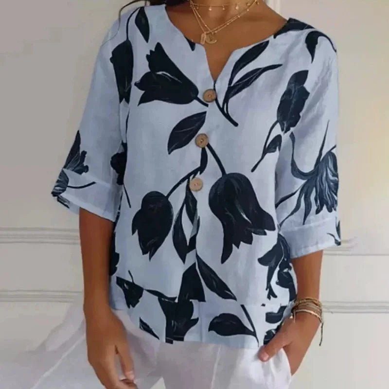 Alba - Blusa floral con cuello en V